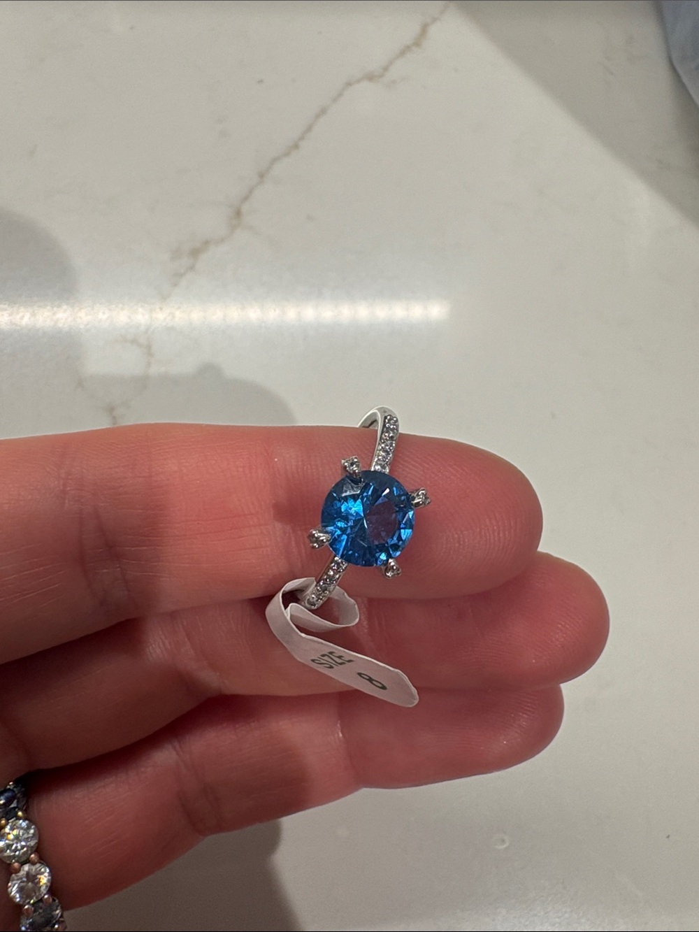 Sterling Silver Ring with Round Blue Gemstone